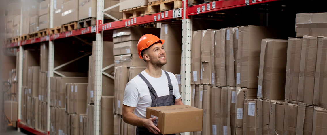 man-carrying-box-medium-shot 1