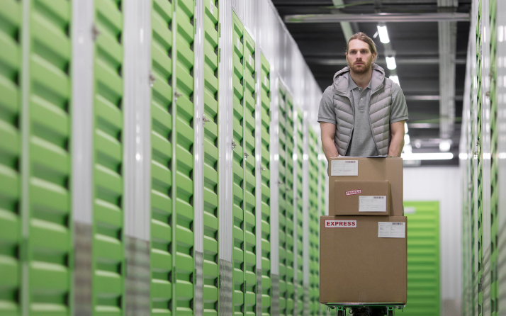 man-working-logistic-center-full-shot 1